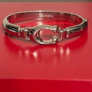 Coach 7 inch bangle bracelet. Barely worn/ like new.